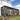 AECOJOY 20'x10' Outdoor Hardtop Metal Gazebo with Curtain and Netting